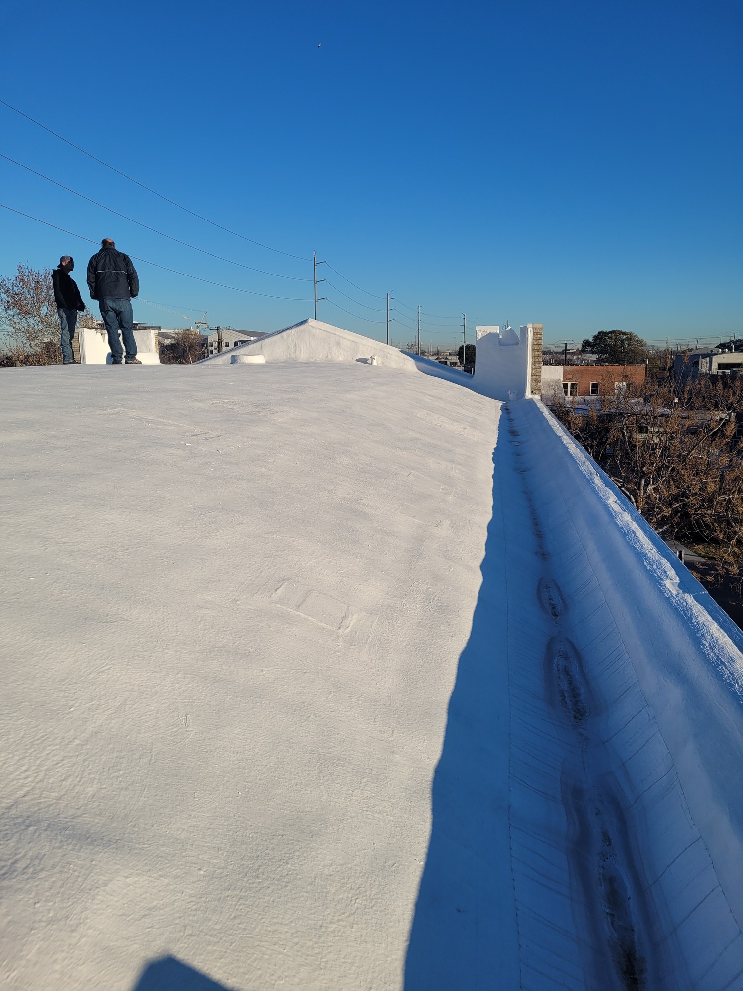 Finished coating at the parapet