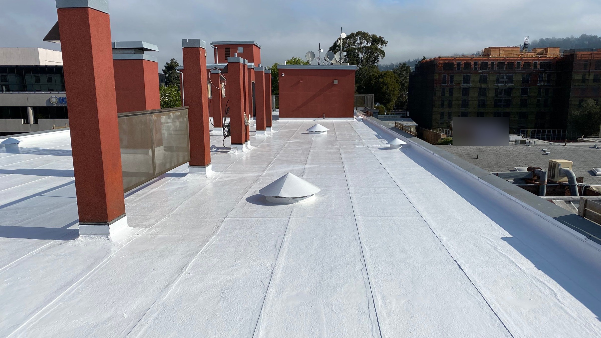 Finished low-slope coating