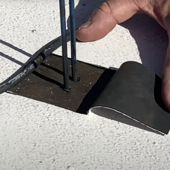 Tramex insulated pins through a roof membrane